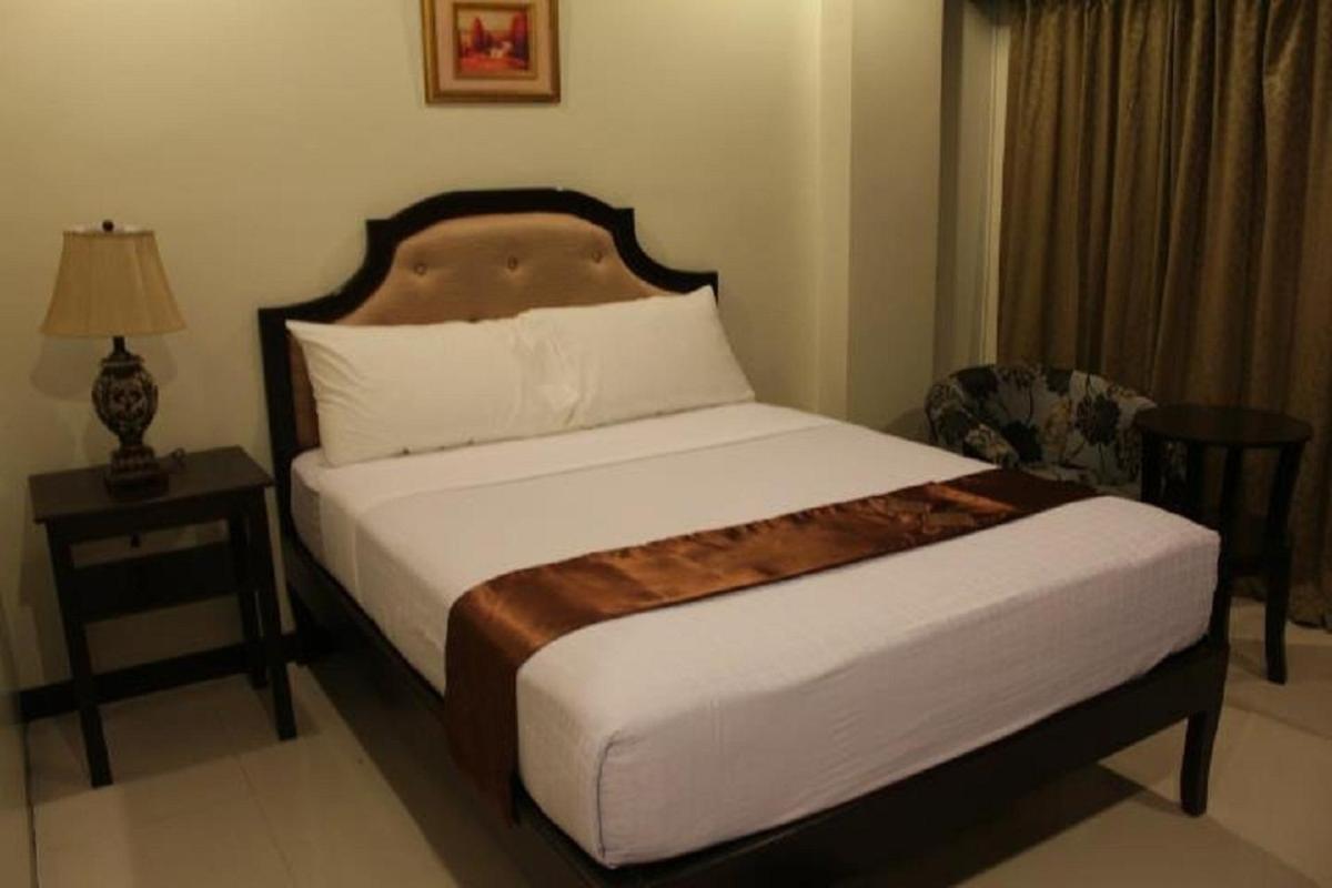 Peridot Suites Davao Habitación foto